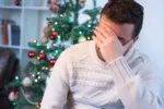 man-felling-depressed-and-lonely-during-the-christmas-time-stockpack-gettyimages-scaled-jpg