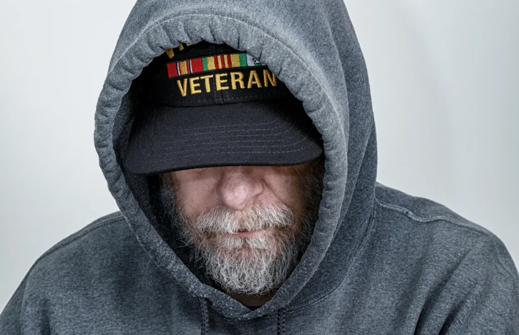 vietnam war veteran with his head down